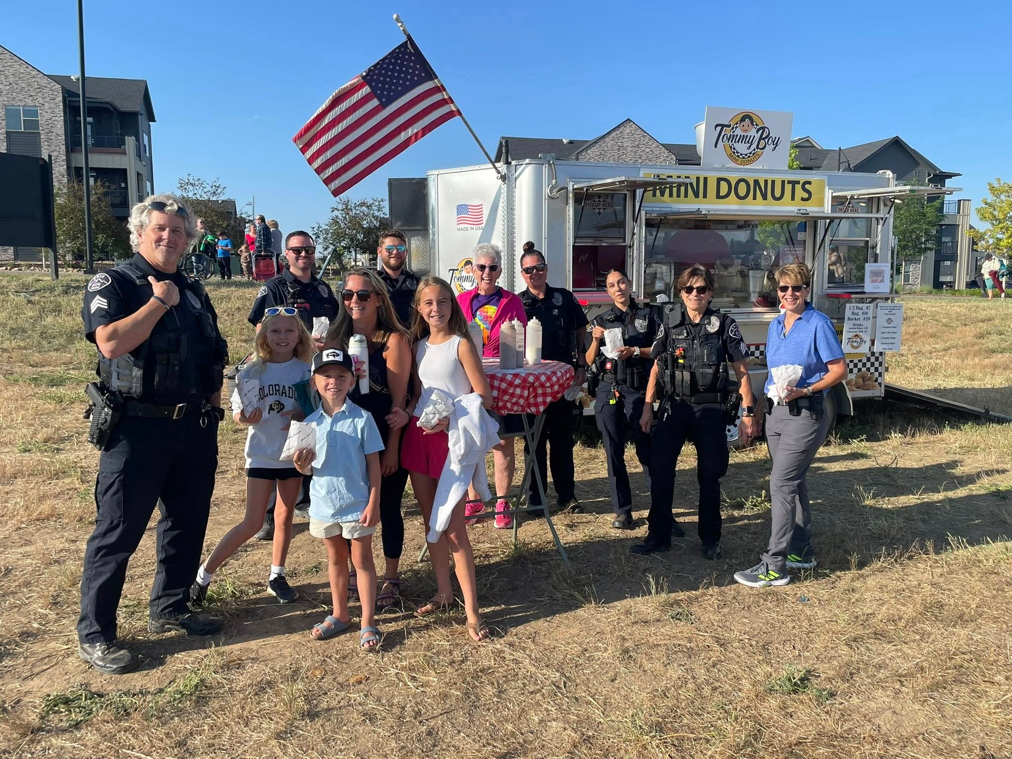 Our Erie police enjoying donuts at the Erie Balloon Festival.