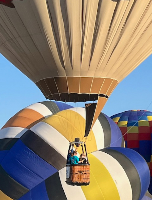 Somethin' Fishy special shape balloon flying by inflating balloons.