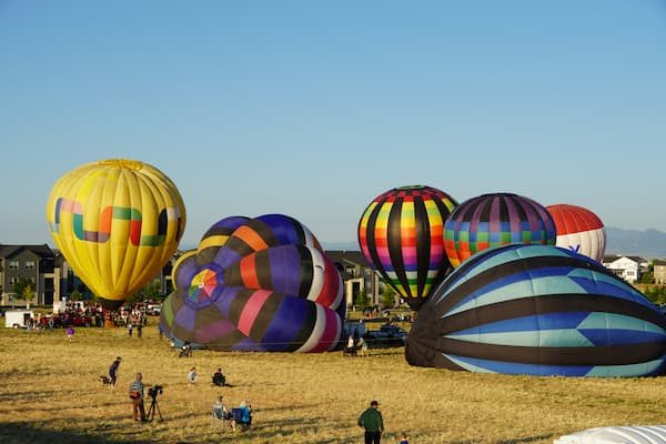 Morning inflation of hot air balloons at the Erie Balloon Festival